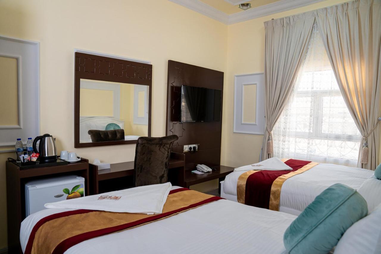 Arkan Al Barzah Hotel Apartment Szúr Kültér fotó